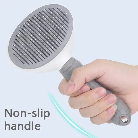 Self-cleaning pet grooming brush